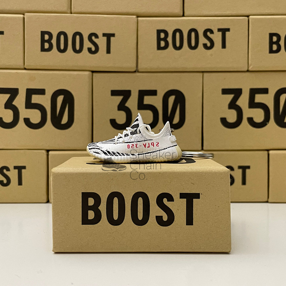 adidas gazelle silver green womens 3D sneaker keychain Yeezy 350 Beluga – Kicks Machine main image 0